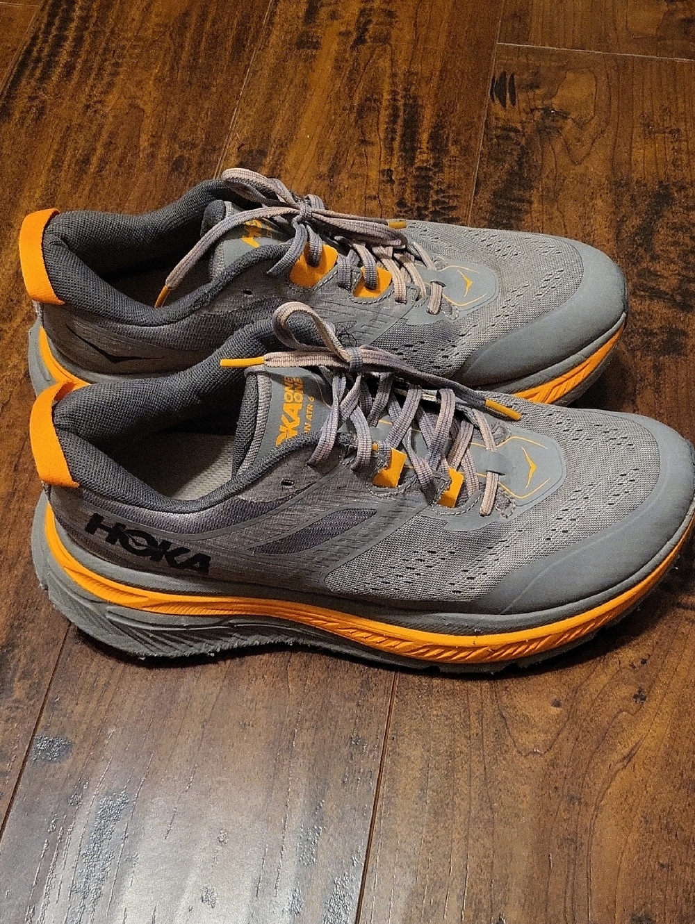 Hoka Men's Gray with Orange Accent Athletic Running Shoes
